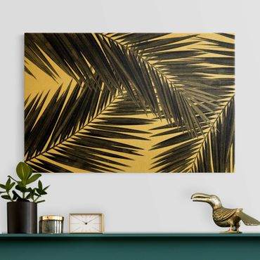 Quadro su tela oro - Vista tra le foglie di palme in bianco e nero