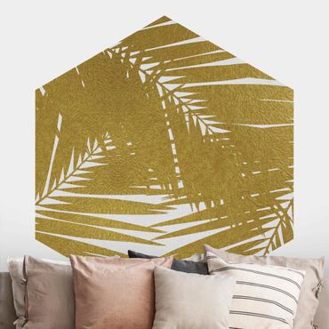 Carta da parati esagonale adesiva con disegni - Scorcio tra foglie di palme dorate