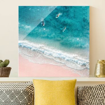 Quadro in vetro - Tre surfisti remano verso la riva