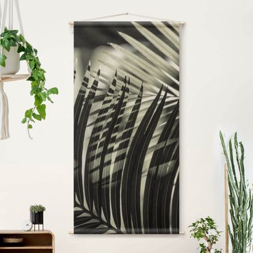 Arazzo da parete - Giochi di ombre su ramo di palma