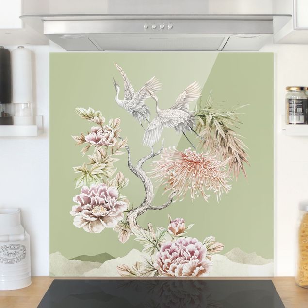 paraschizzi cucina vetro magnetico Acquerello cicogne in volo con fiori sul verde