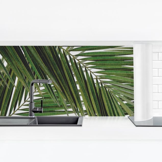 Rivestimento cucina verde Vista attraverso le foglie di palma verde