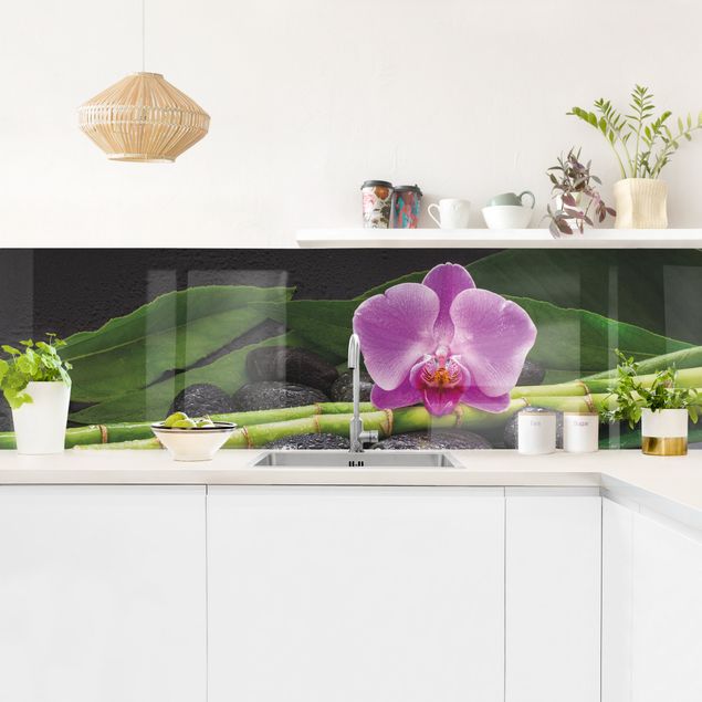 rivestimento adesivo cucina Bambù verde con fiore di orchidea