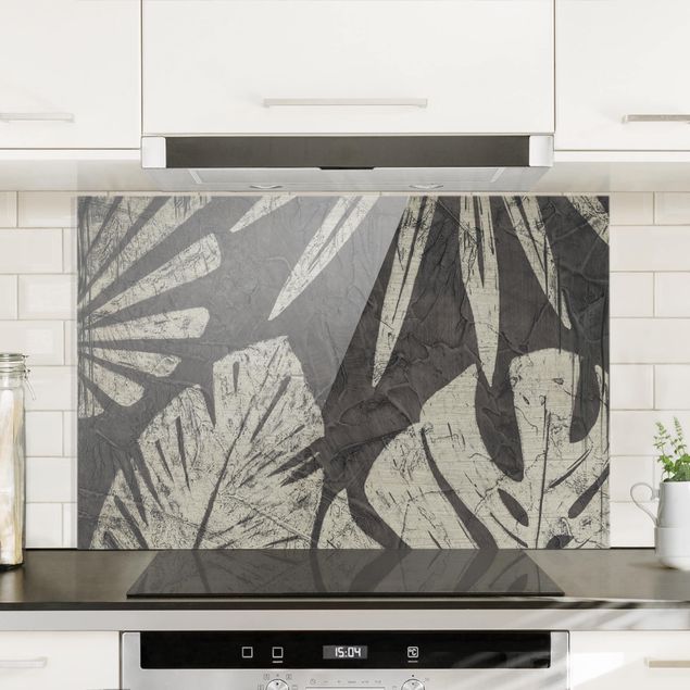 paraschizzi cucina vetro magnetico Sfondo grigio scuro con foglie di palma