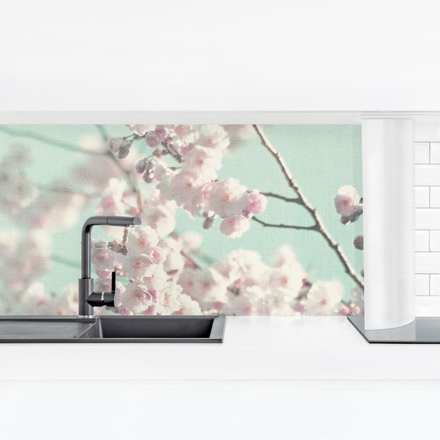 pannello adesivo per cucina Danza di fiori di ciliegio su struttura di lino