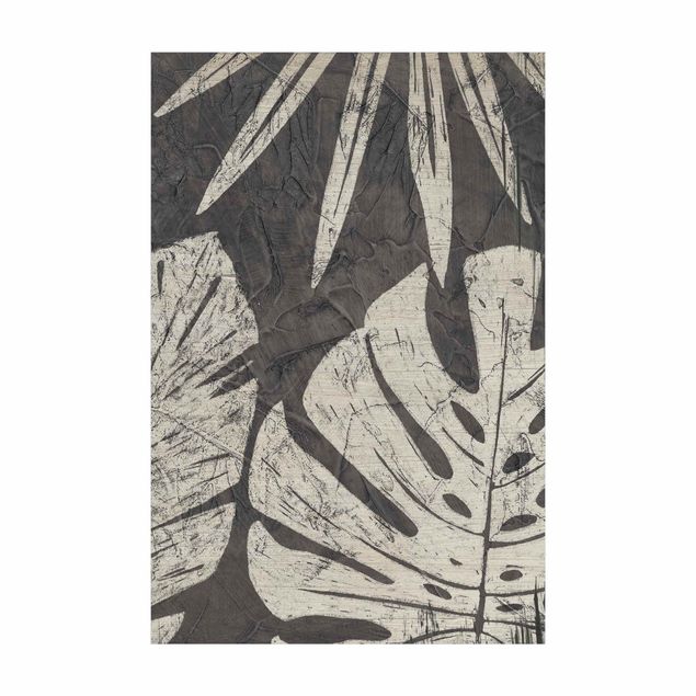 Tappeti grigi Sfondo grigio scuro con foglie di palma