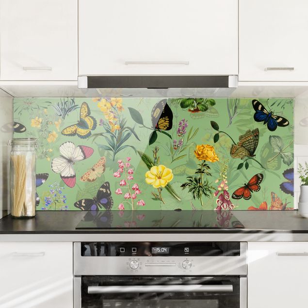 paraschizzi cucina vetro magnetico Farfalle con fiori su verde