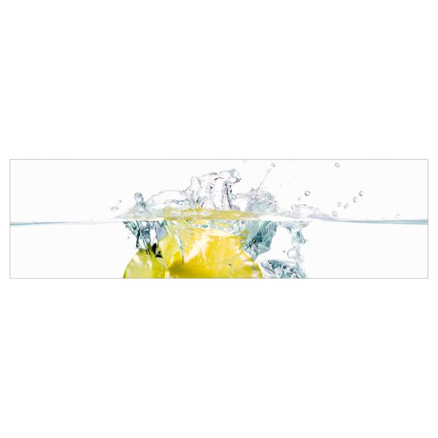 paraschizzi bianco cucina Limone e lime in acqua