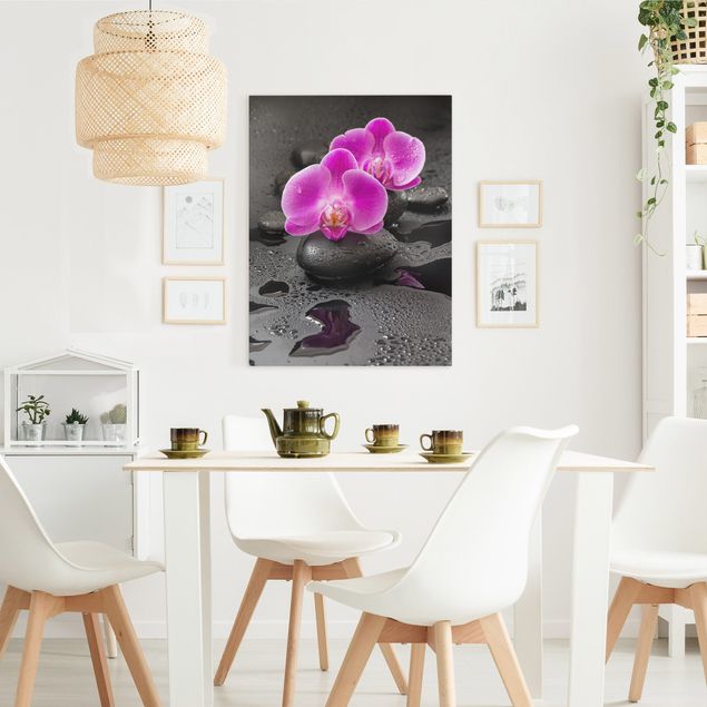 Stampe su tela fiori Fiore di orchidea rosa su pietra con gocce