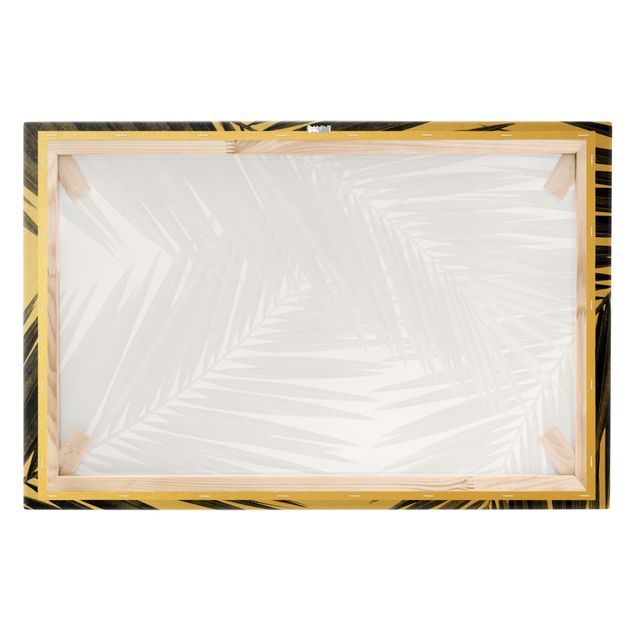 Quadro su tela oro - Vista tra le foglie di palme in bianco e nero