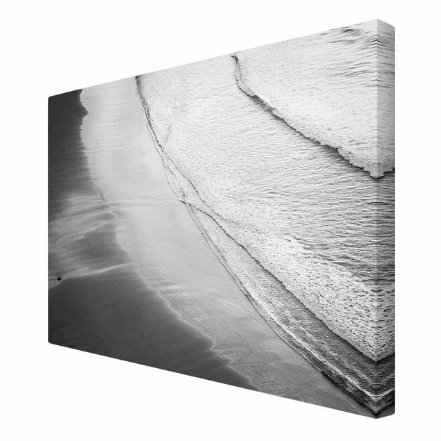 Quadro su tela - Morbide onde sulla spiaggia in bianco e nero