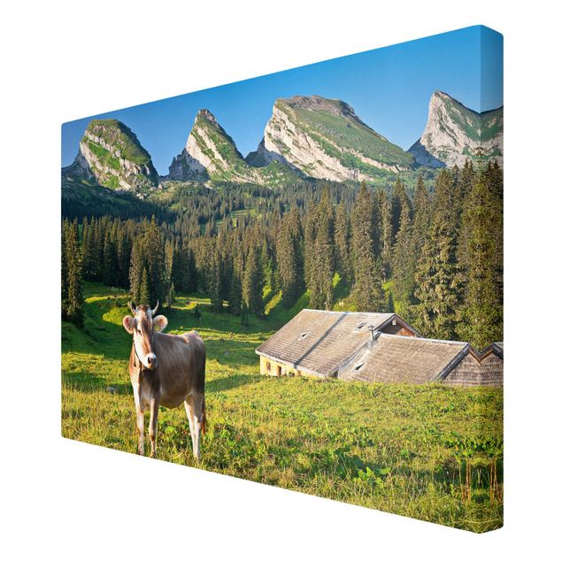 Quadri moderni per soggiorno Prato alpino svizzero con mucca