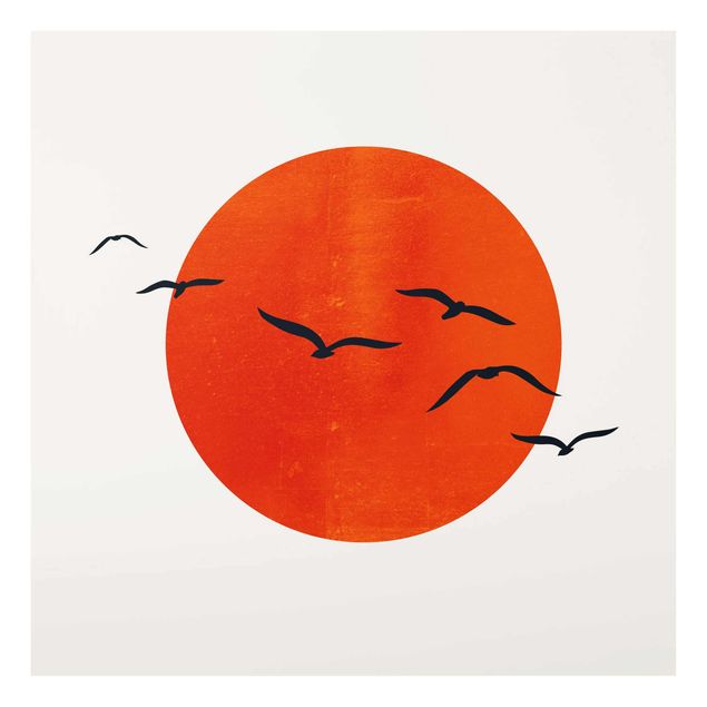 Quadro in vetro - Stormo di uccelli davanti al sole rosso - Quadrato 1:1