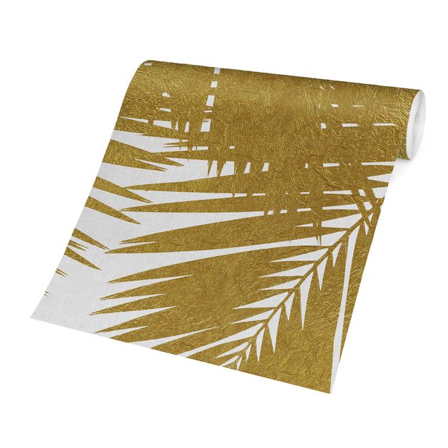 Carta da parati - Scorcio tra foglie di palme dorate