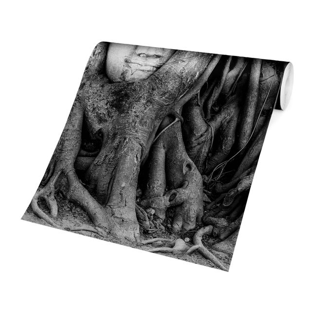Carta da parati - Buddha in Ayutthaya lined by tree roots in black-and-white