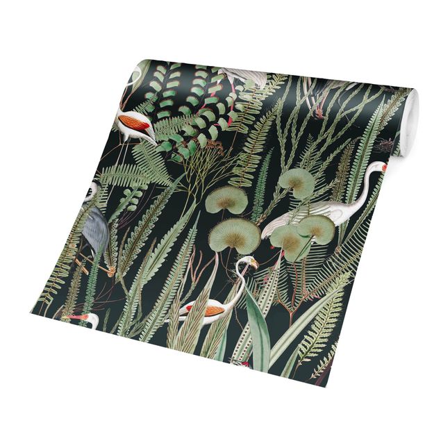 Carta da parati - Fenicotteri e cicogne con piante su sfondo verde