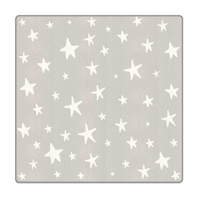 Tappeti  - Grandi stelle disegnate con cielo grigio