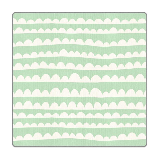 Tappeti  - Fasce di nuvole bianche disegnate nel cielo verde