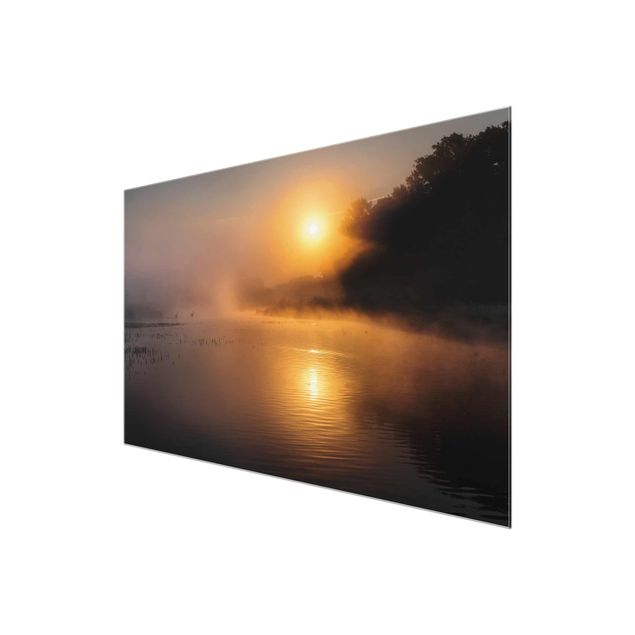Quadro in vetro - Sunrise at the lake with deers in the fog - Panoramico