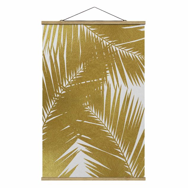 Foto su tessuto da parete con bastone - Scorcio tra foglie di palme dorate - Verticale 2:3