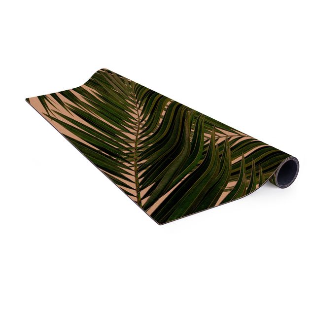 Tappeti effetto naturale Vista attraverso le foglie di palma verde
