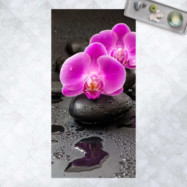 Tappeto per terrazzo esterno Fiore di orchidea rosa su pietra con gocce