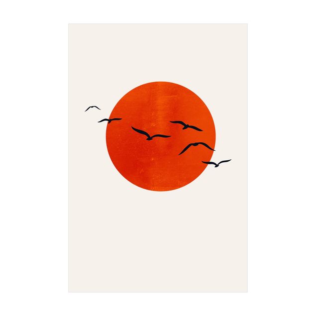 Tappeti effetto naturale Stormo di uccelli di fronte al sole rosso I