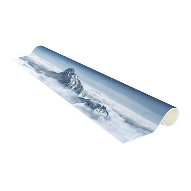 Tappeto blu soggiorno Le Alpi sopra le nuvole