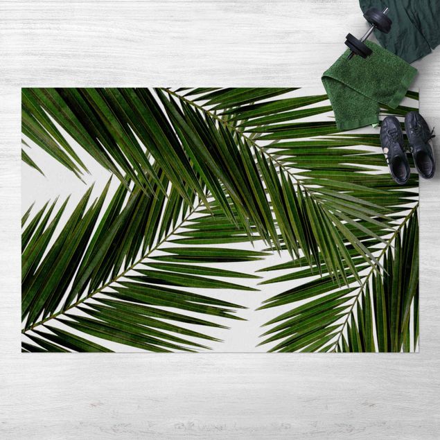 Tappeto da balcone Vista attraverso le foglie di palma verde