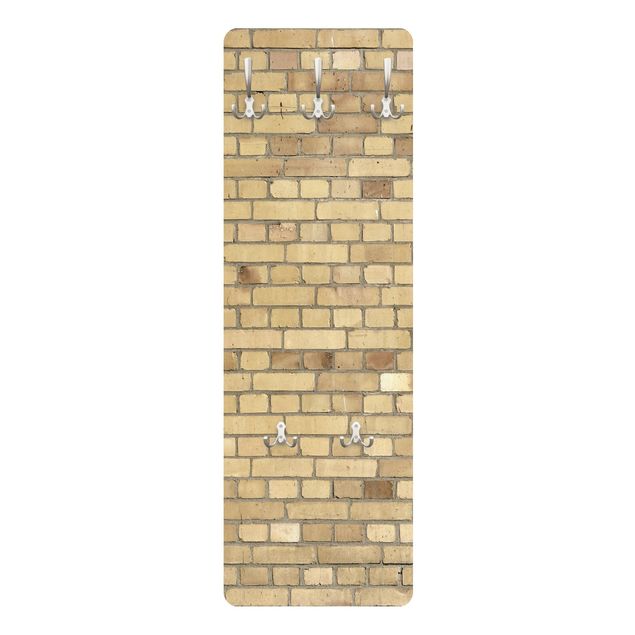 Appendiabiti effetto pietra - Muro in mattoni giallo chiaro