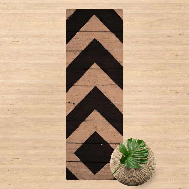 Tappeti moderni Motivo simmetrico su tronchi di legno