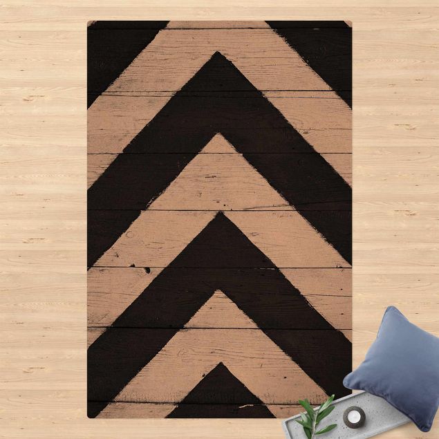 Tappeti moderni Motivo simmetrico su tronchi di legno