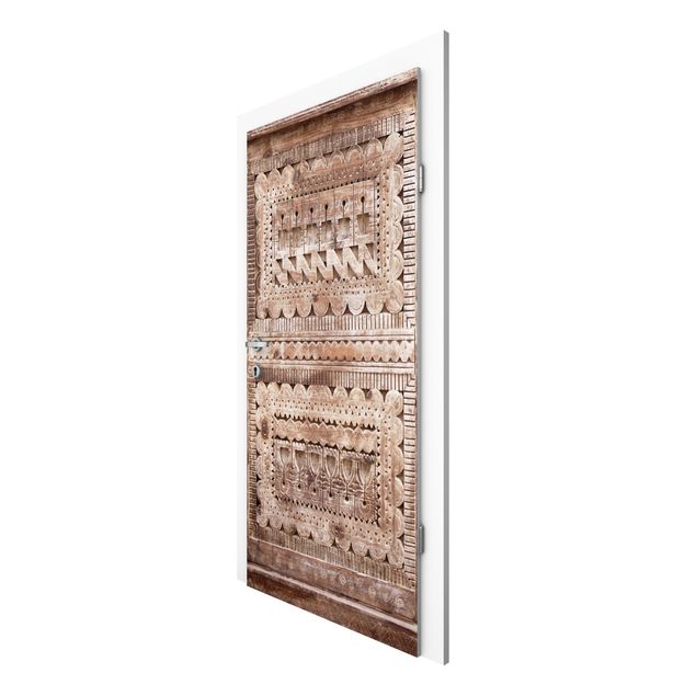 Carta da parati per porte - Old ornate Moroccan wooden door in Essaouria