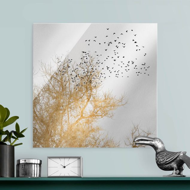 Lavagna magnetica vetro Stormo di uccelli davanti all'albero d'oro