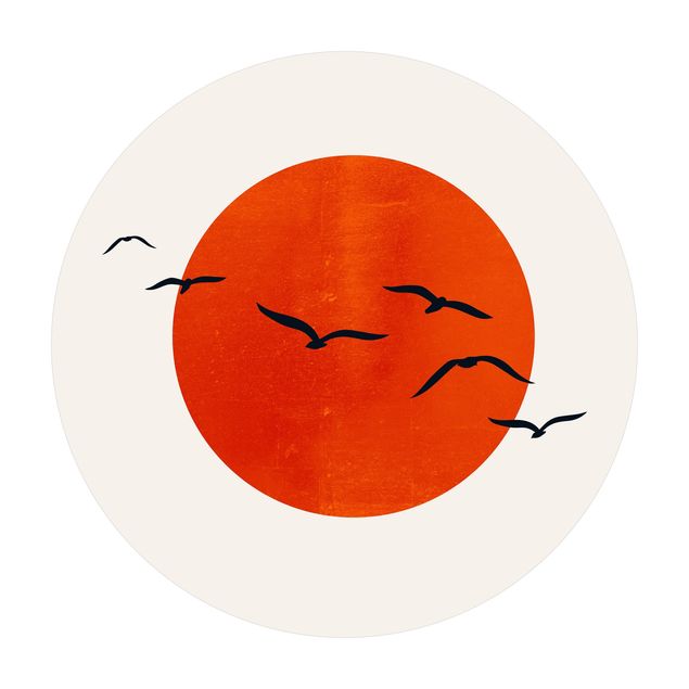 Tappeto in vinile rotondo - Stormo di uccelli davanti al sole rosso