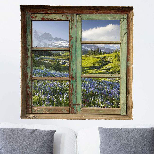 Adesivo murale 3D - Vista dalla finestra di un prato di montagna con fiori davanti al monte Rainier